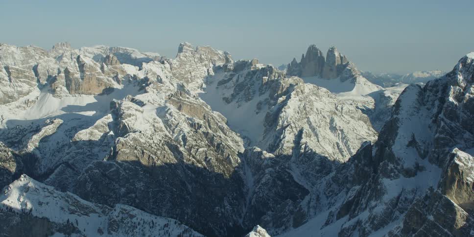 Snow covers mountains in the wilderness