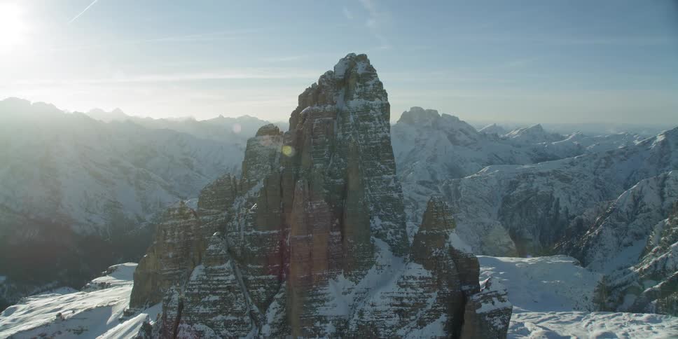 In the middle of the mountain range is one pointing hill