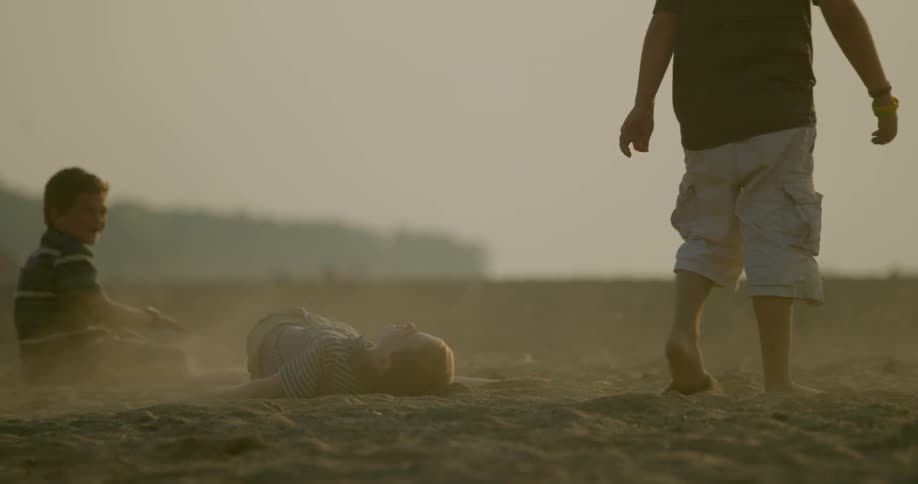 Children are playing in the sand