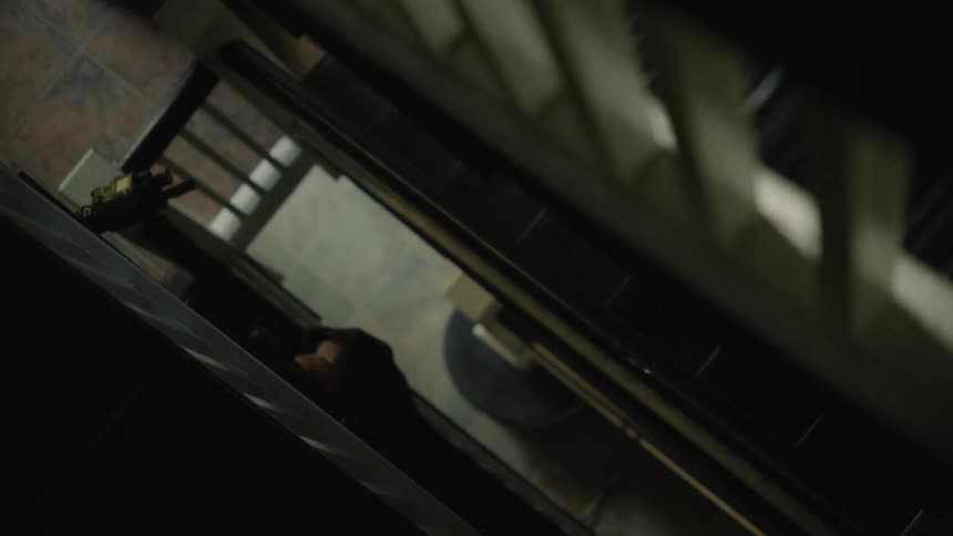 The police descend the stairs with rifles