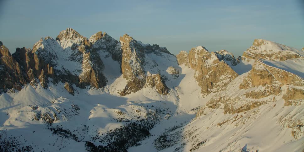 Snow covers the mountain landscape