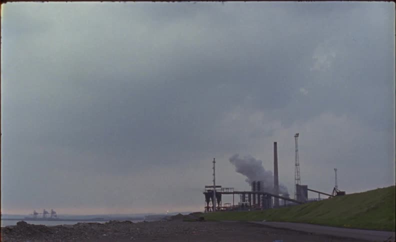 The plant ahead is giving off lots of smoke