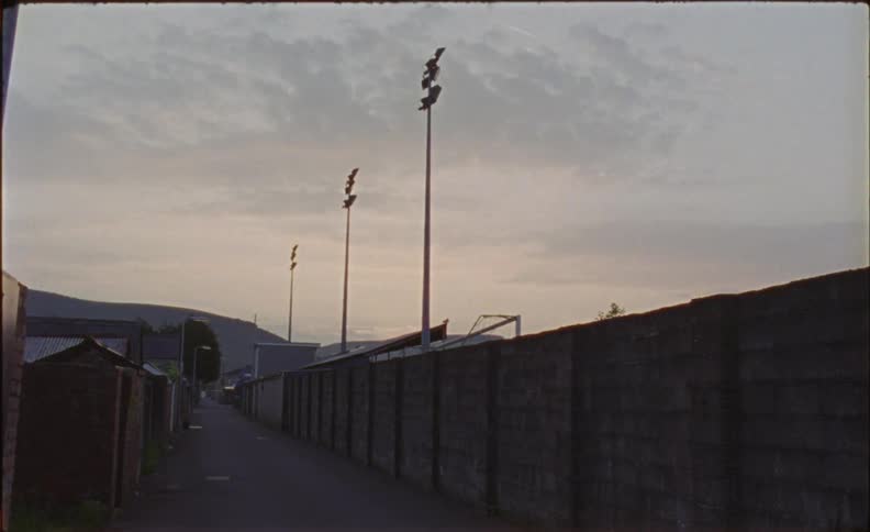 The alley is empty at sunset
