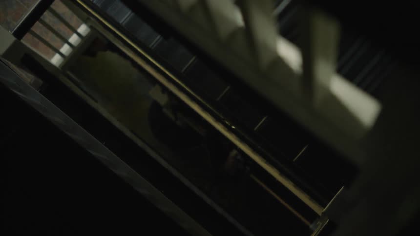 A swat team climbs the staircase with guns drawn