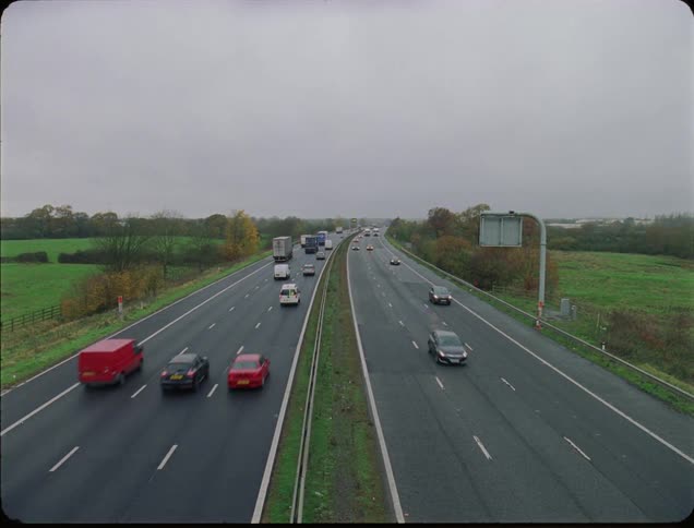 Cars travel on a freeway