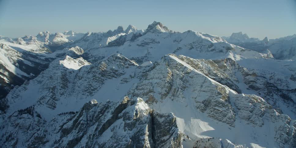 Snow and ice cover the mountains