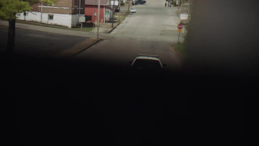Vehicle diving behind a police car