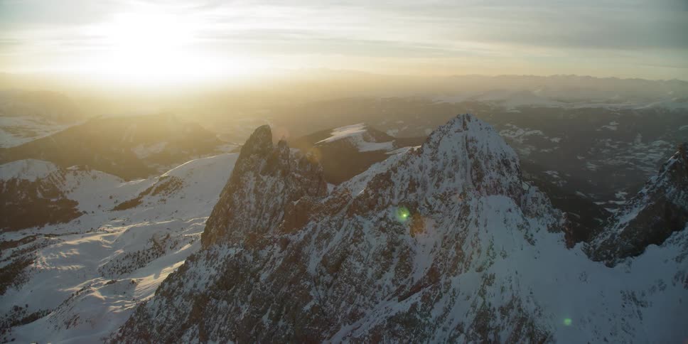 Sass Rigais mountain peaks covered in snow at sunset