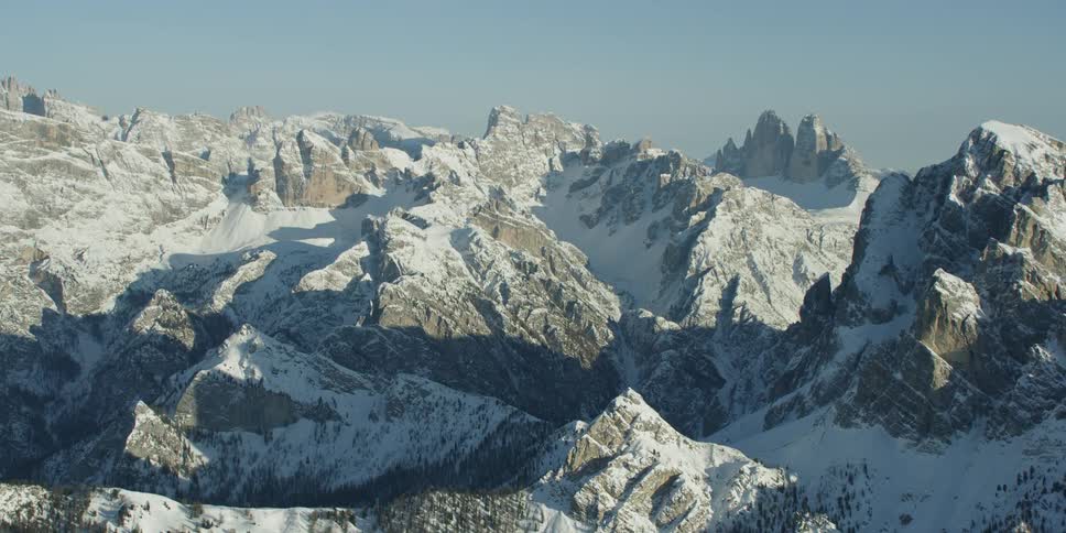 The mountain range is vast and covered with ice