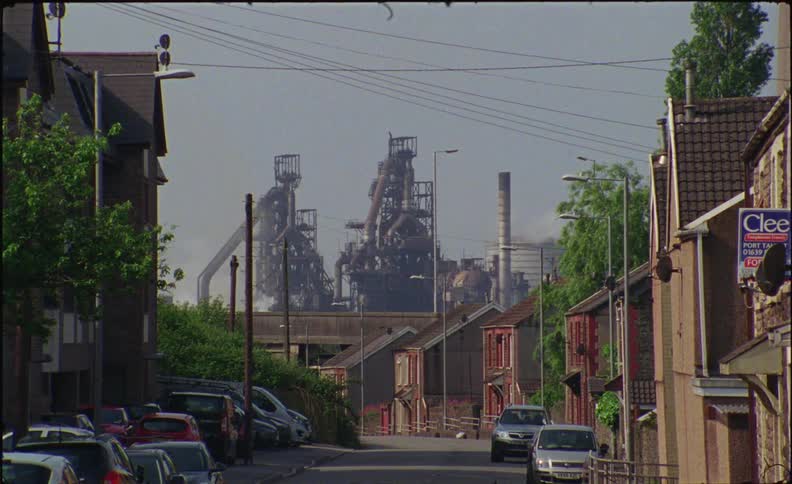 A factory sits in a city