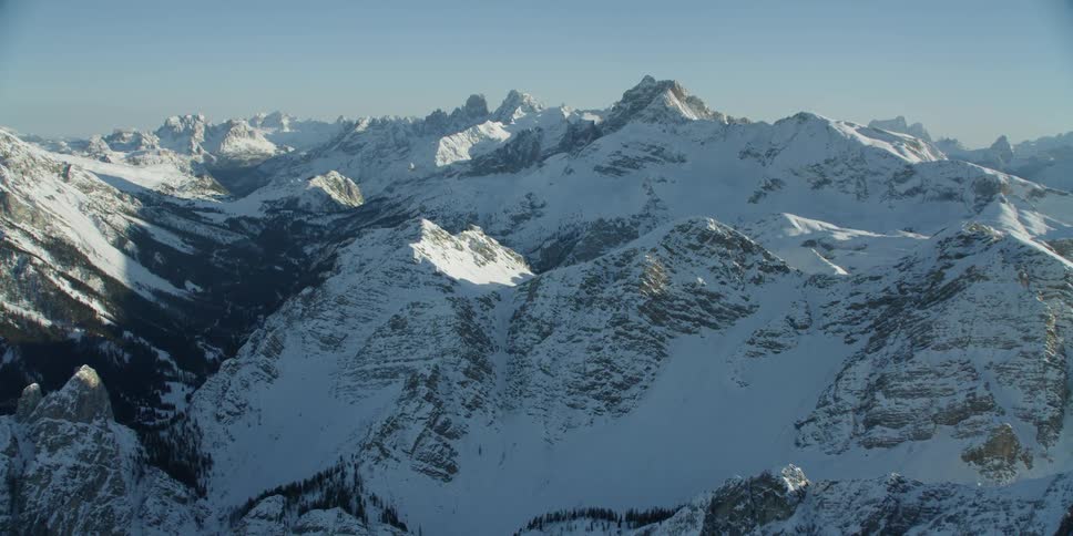 Snow covers mountains in the wilderness
