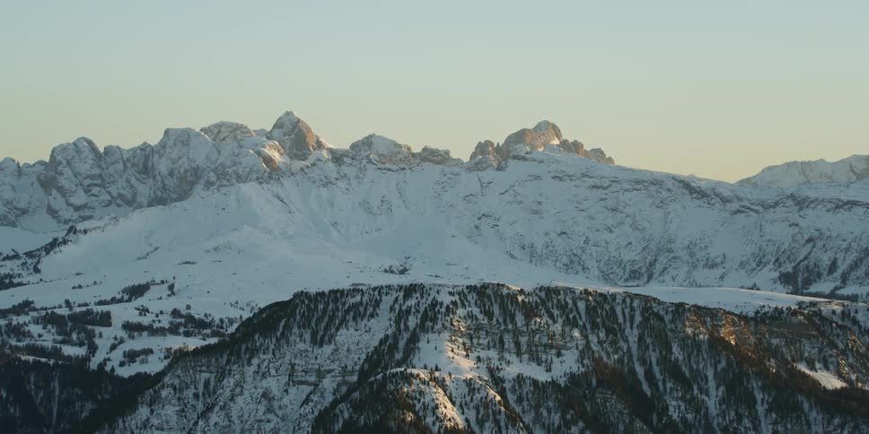 Heavy slopes cover the mountains ahead