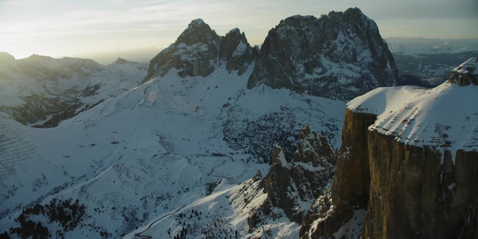 Sunlight is streaming onto Sellajoch pass in the Dolomites