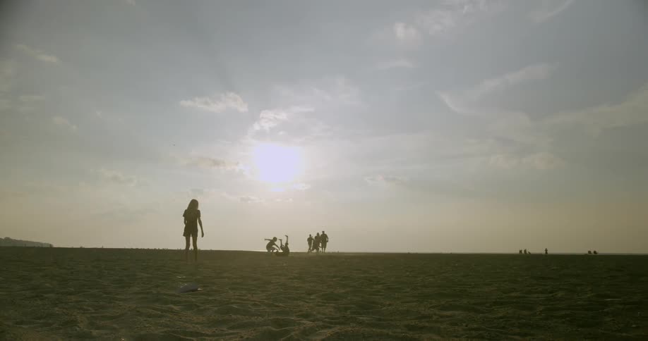 People are playing in the field