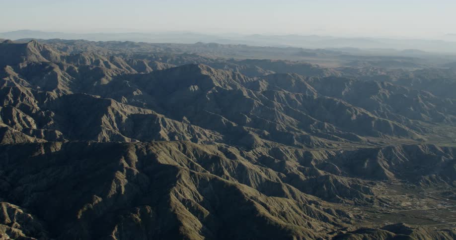 Mountains cover a rural landscape