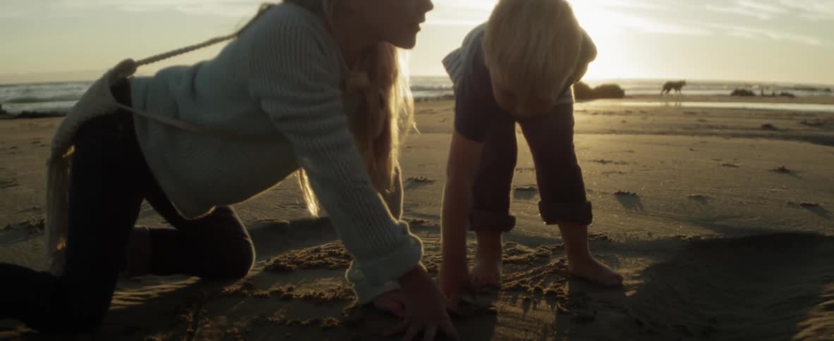 A mother and child are palying