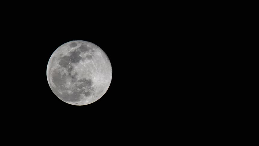 The moon illuminates the night sky