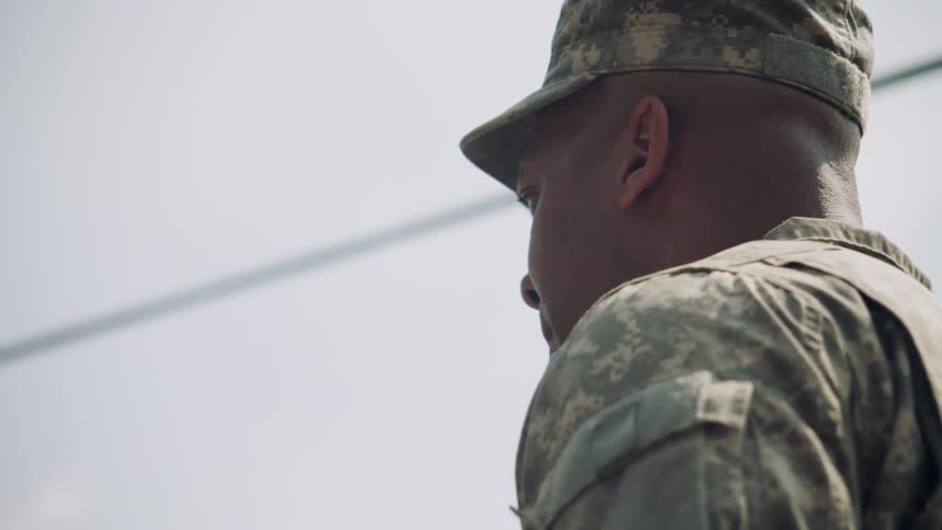 A military officer yells
