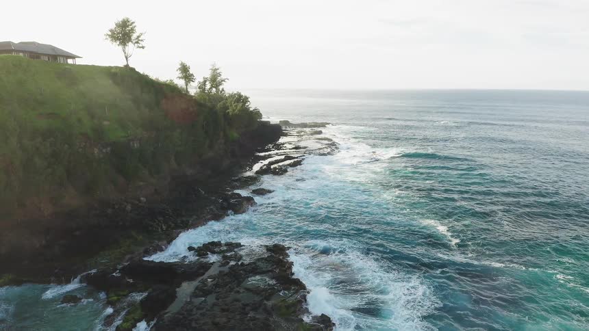 The water along the shore is blue