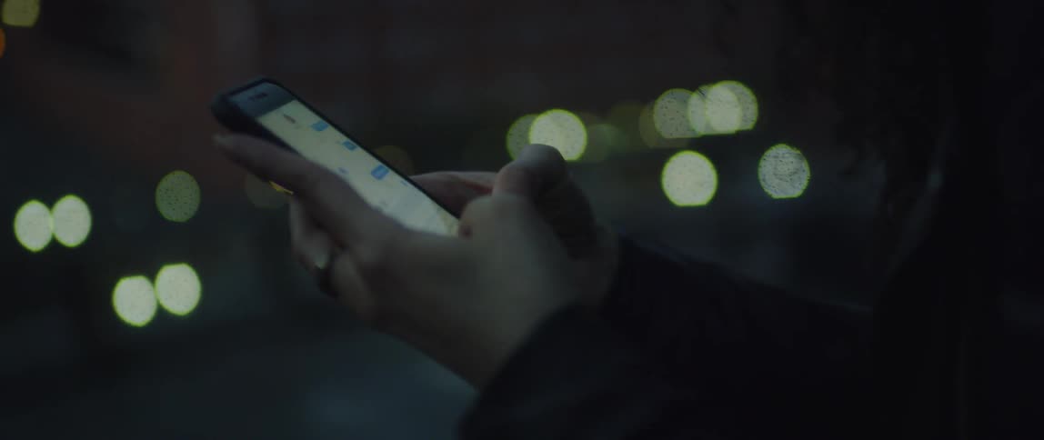 A woman uses her cell phone