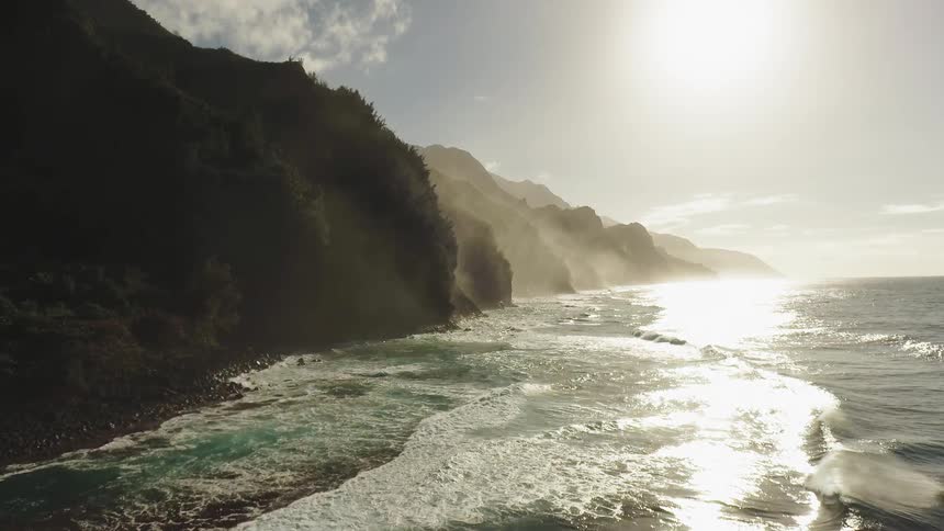 Ocean waves come to shore on a sunny day