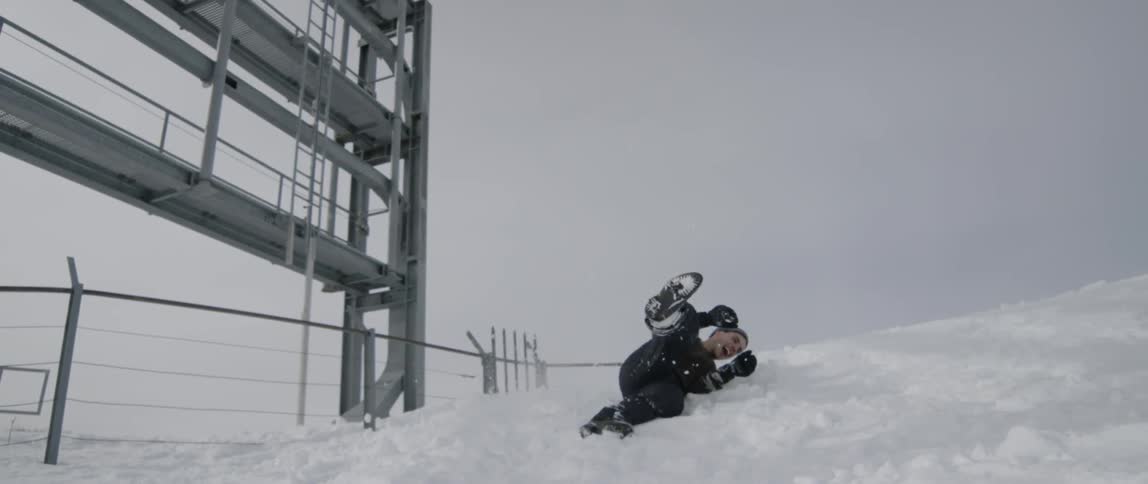 A man tumbles in the snow
