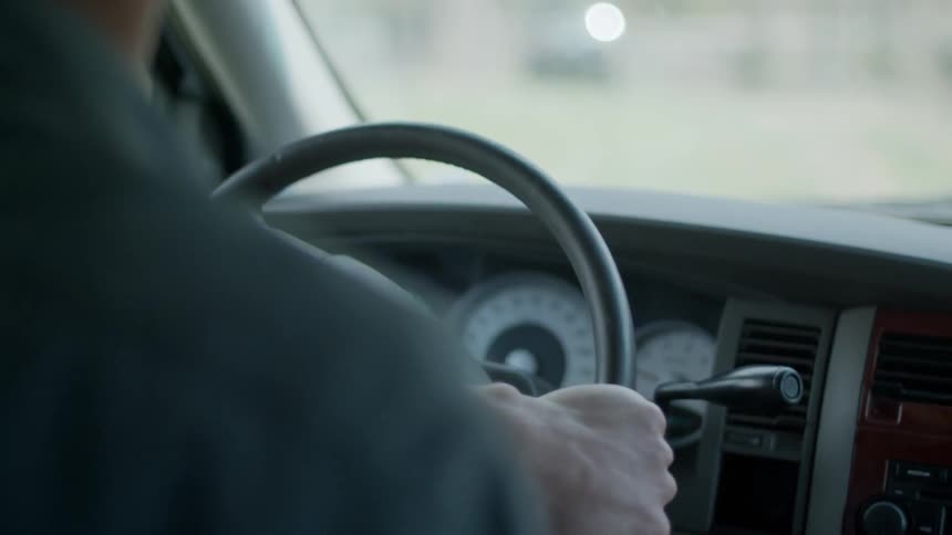 A person is driving a car
