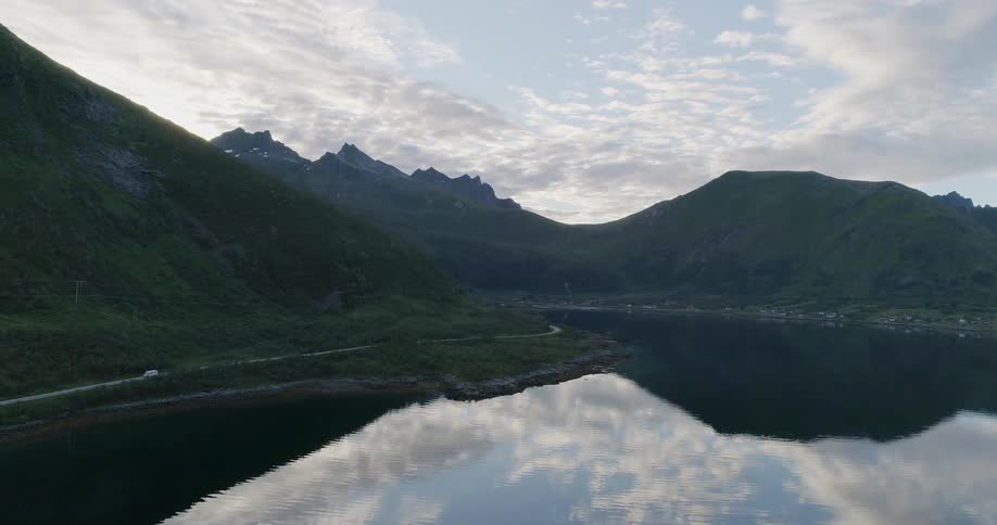 Mountains surround a calm lake