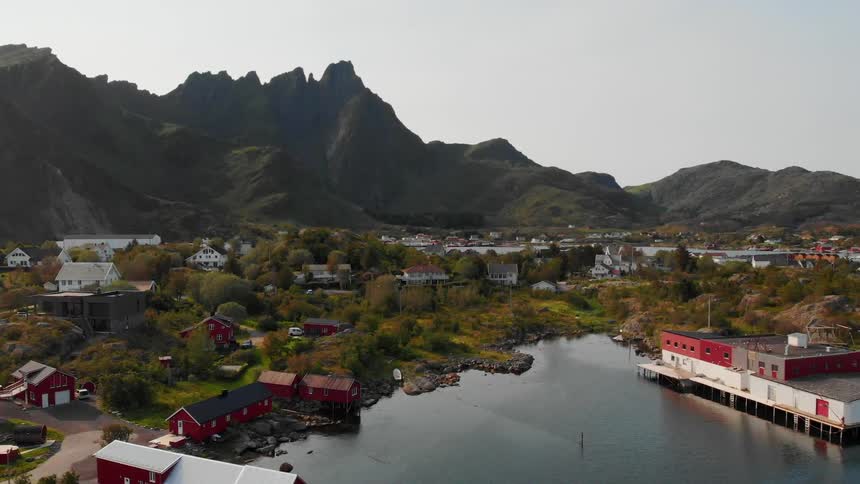 A small village near mountains and a lake
