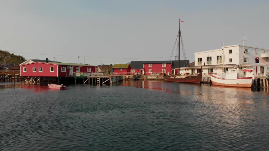Boats sit docked in a harbor