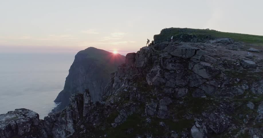 Tall cliff overlooking a large body of water