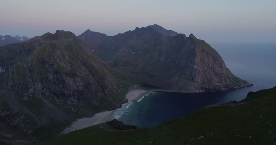 The mountains run right up to the shore