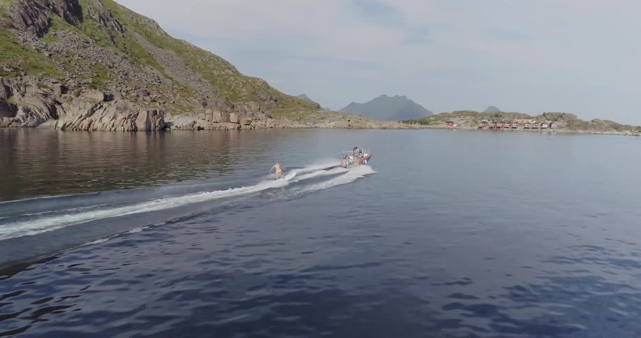 A boat floats on a lake