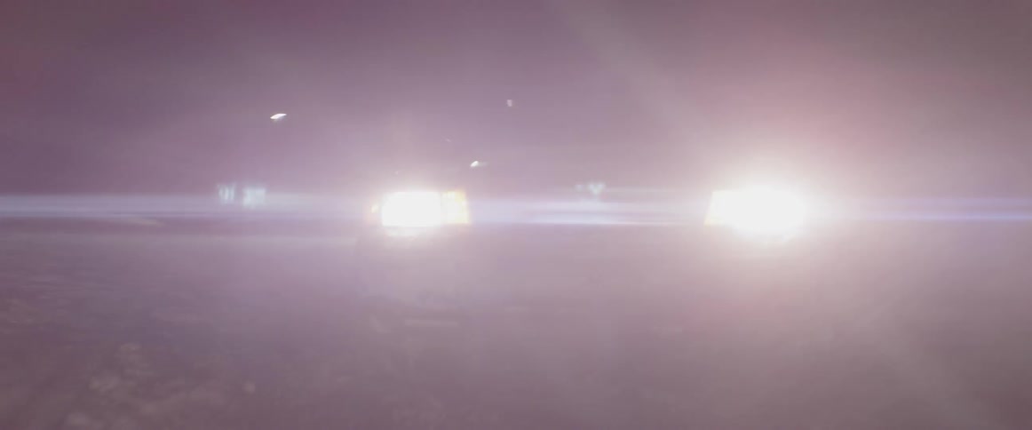 A car travels over the snow as it skids