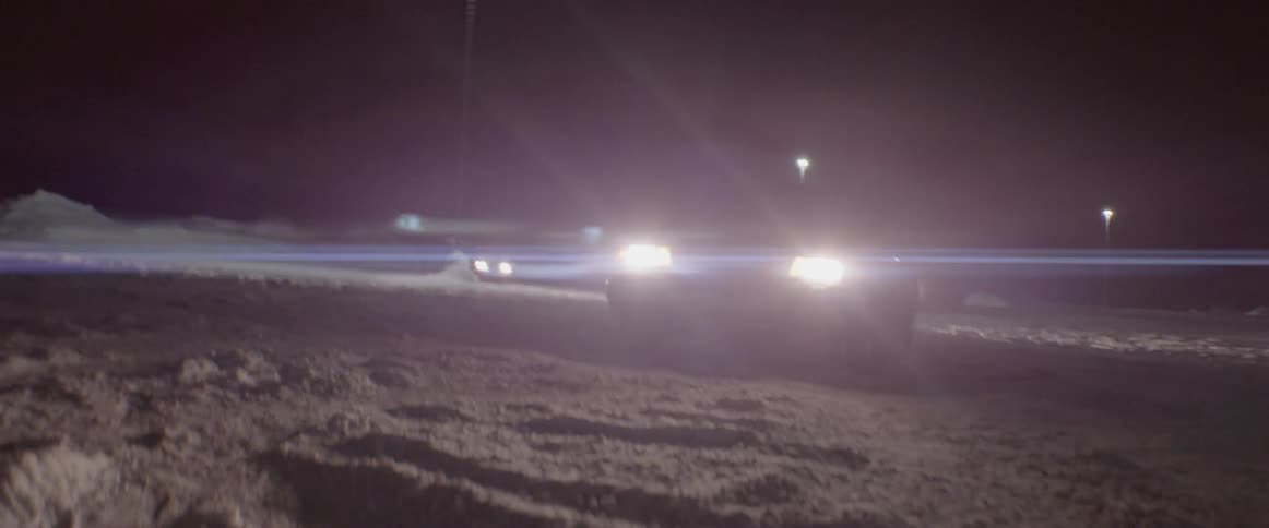 Car spins cookies in a snowy parking lot