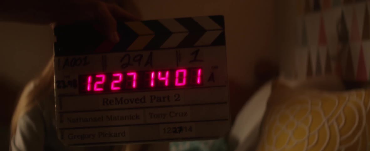 A scene is being filmed with a girl