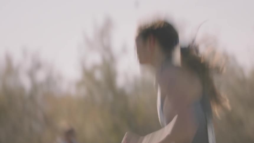 Woman runs in an outdoor race