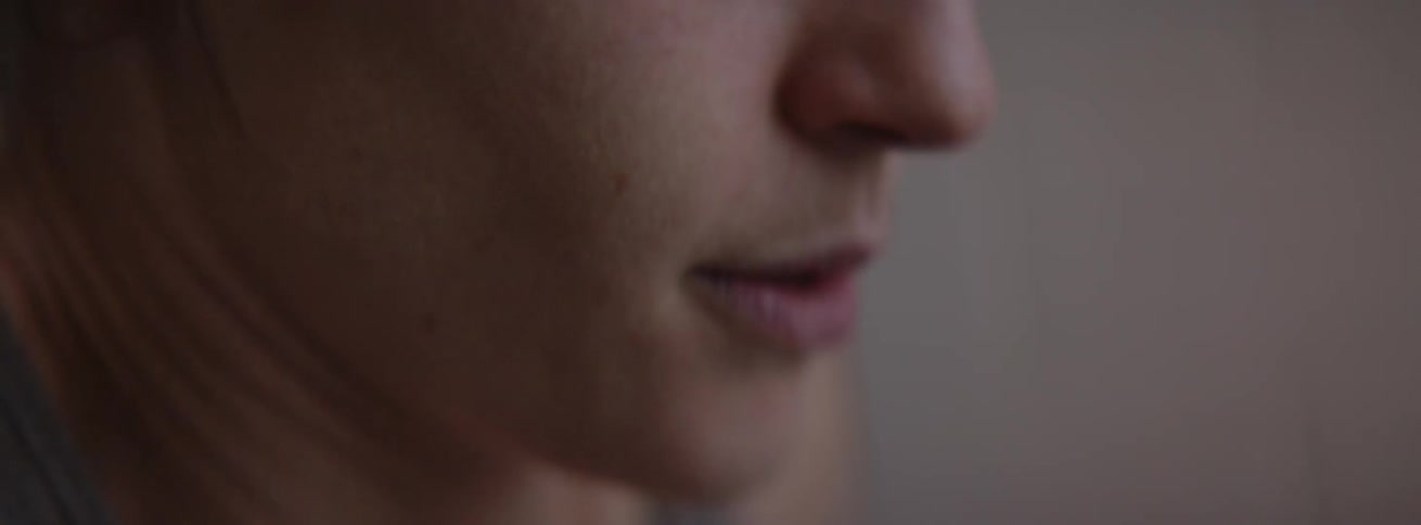 Woman exhales and breathes heavily