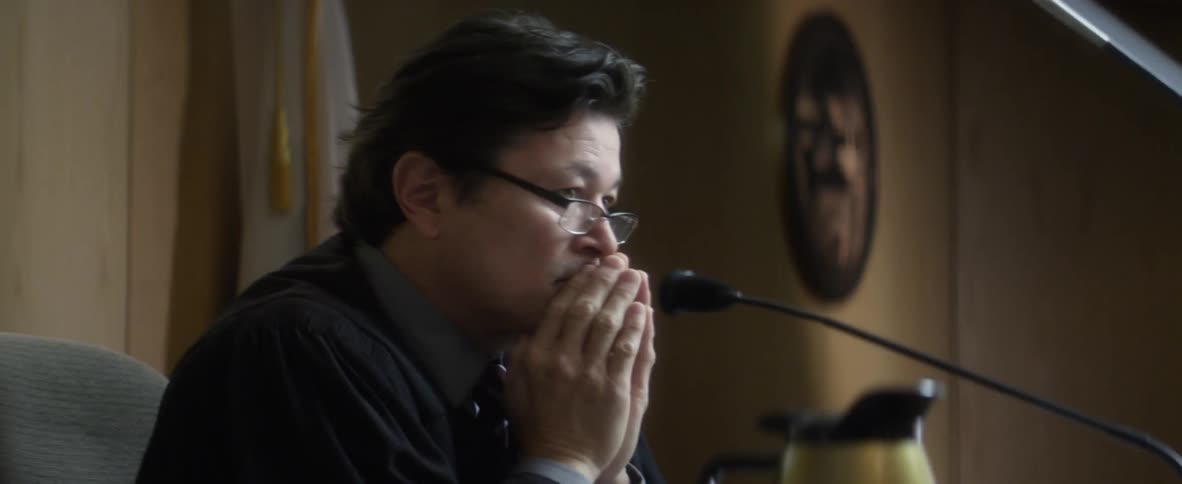 A man is acting in a scene