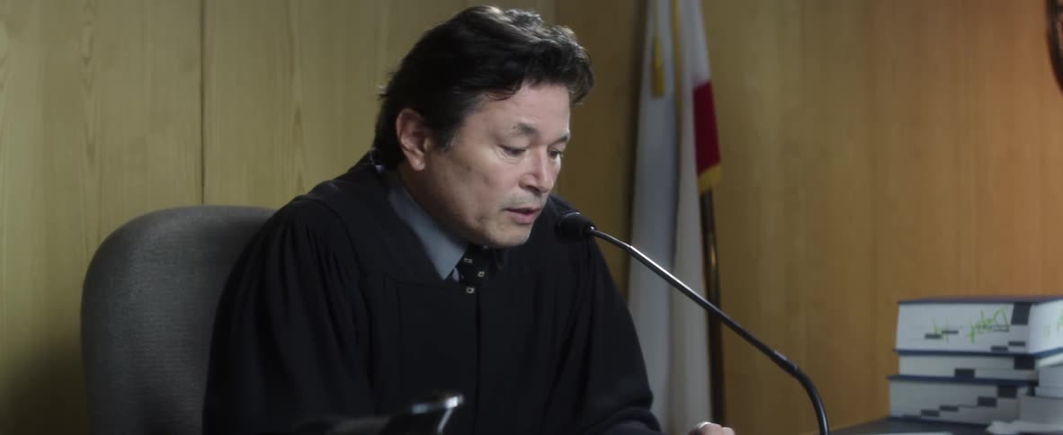 A judge is speaking to the court