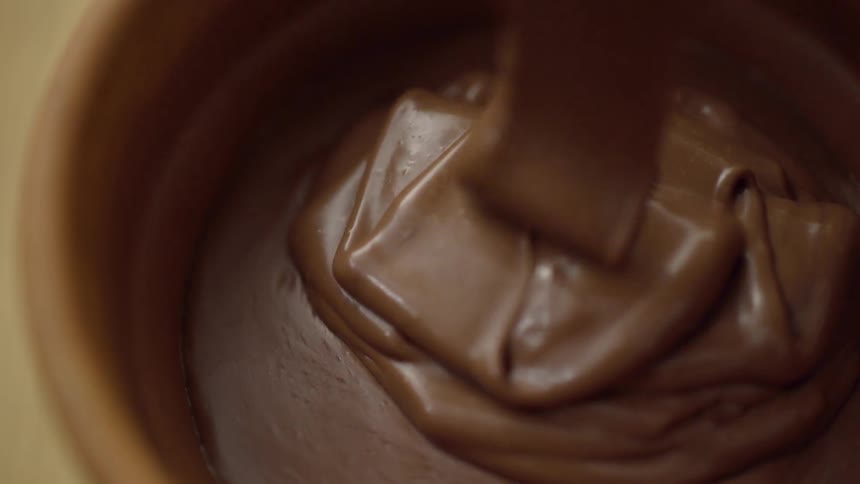 Cake batter is being poured