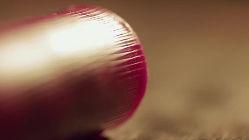 There is a shotgun shell on the table