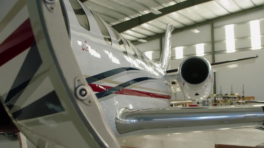Airplane in a large airplane garage