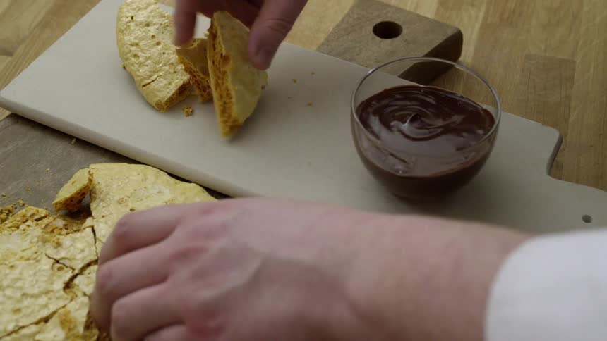 Bread being served with a sauce