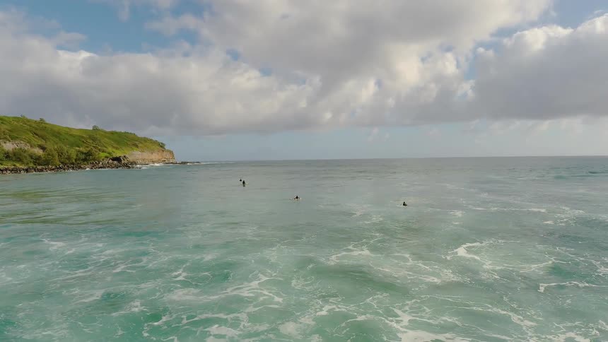 Waves ripple in a rocky ocean bay