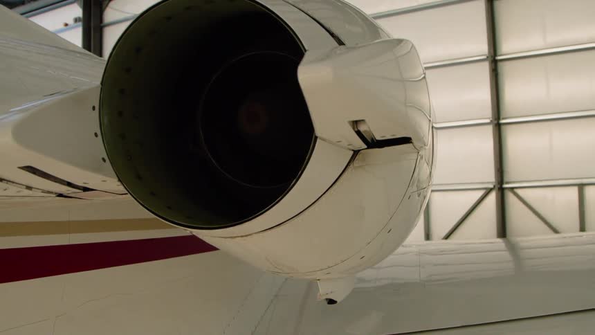 The large engine of the plane is dark inside
