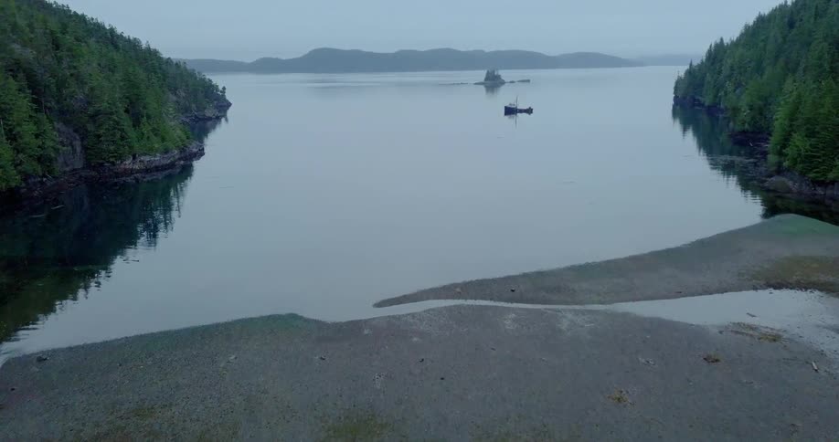 A boat sits in the lake canal