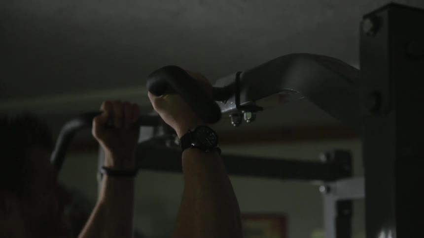 A man doing pull ups