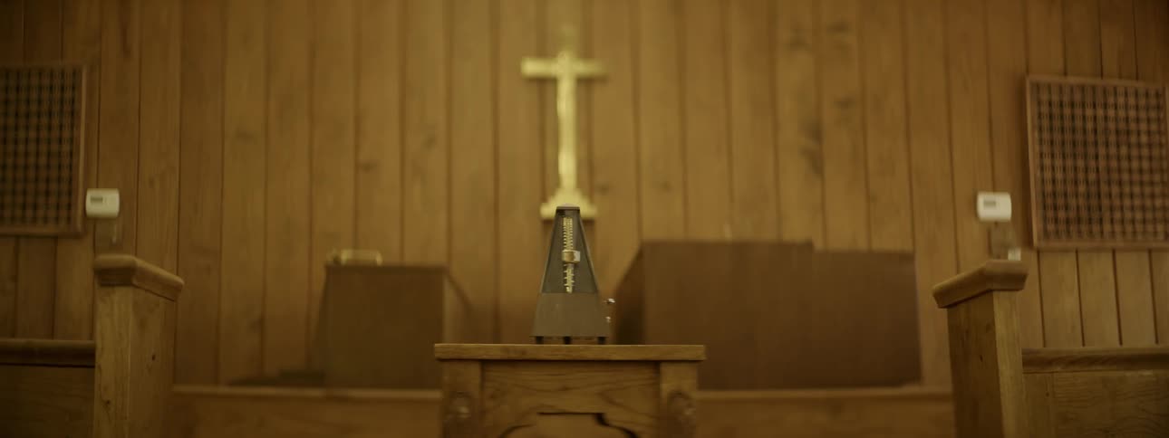 A metronome ticks in a church chapel