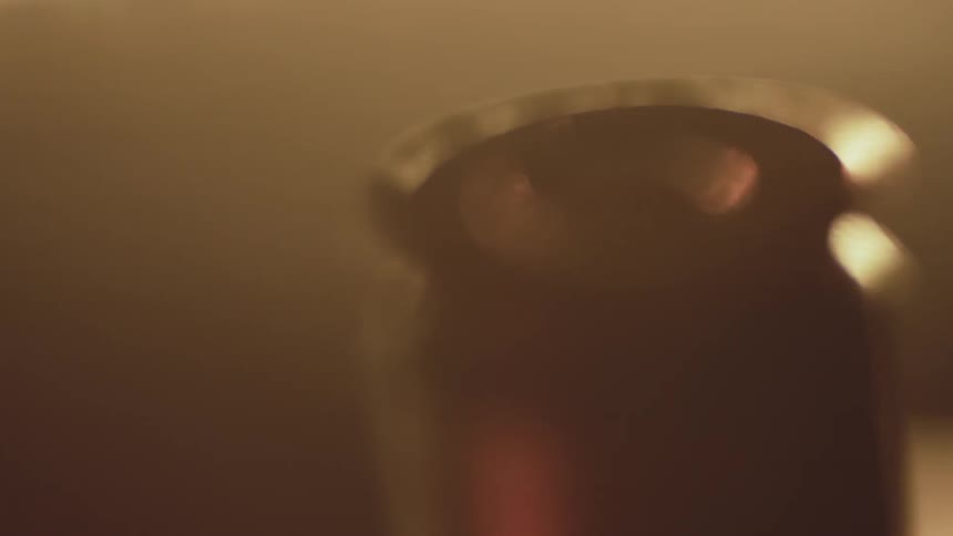 Piece of metal in a dim room